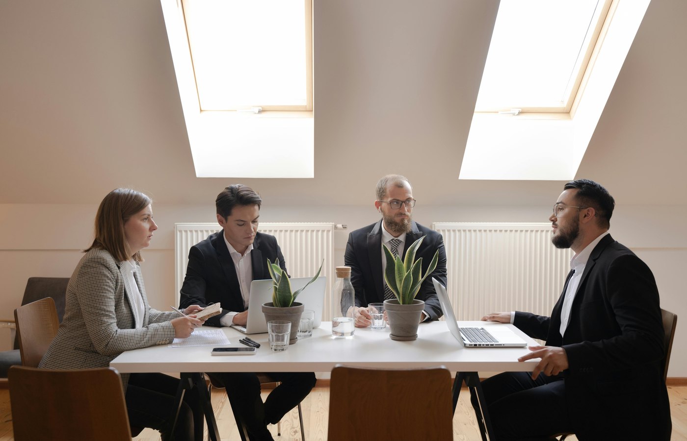 Formal professional discussion at a meeting table